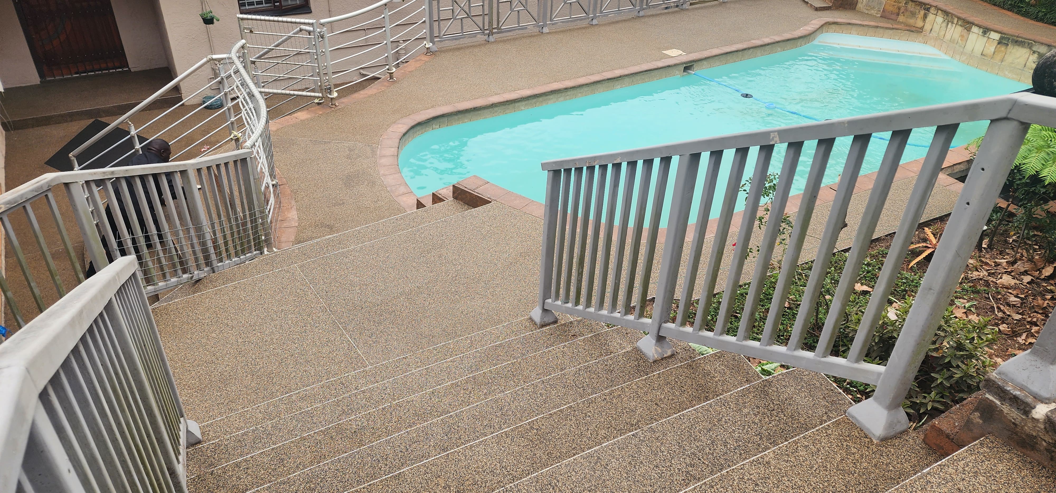 Pebbles around a pool