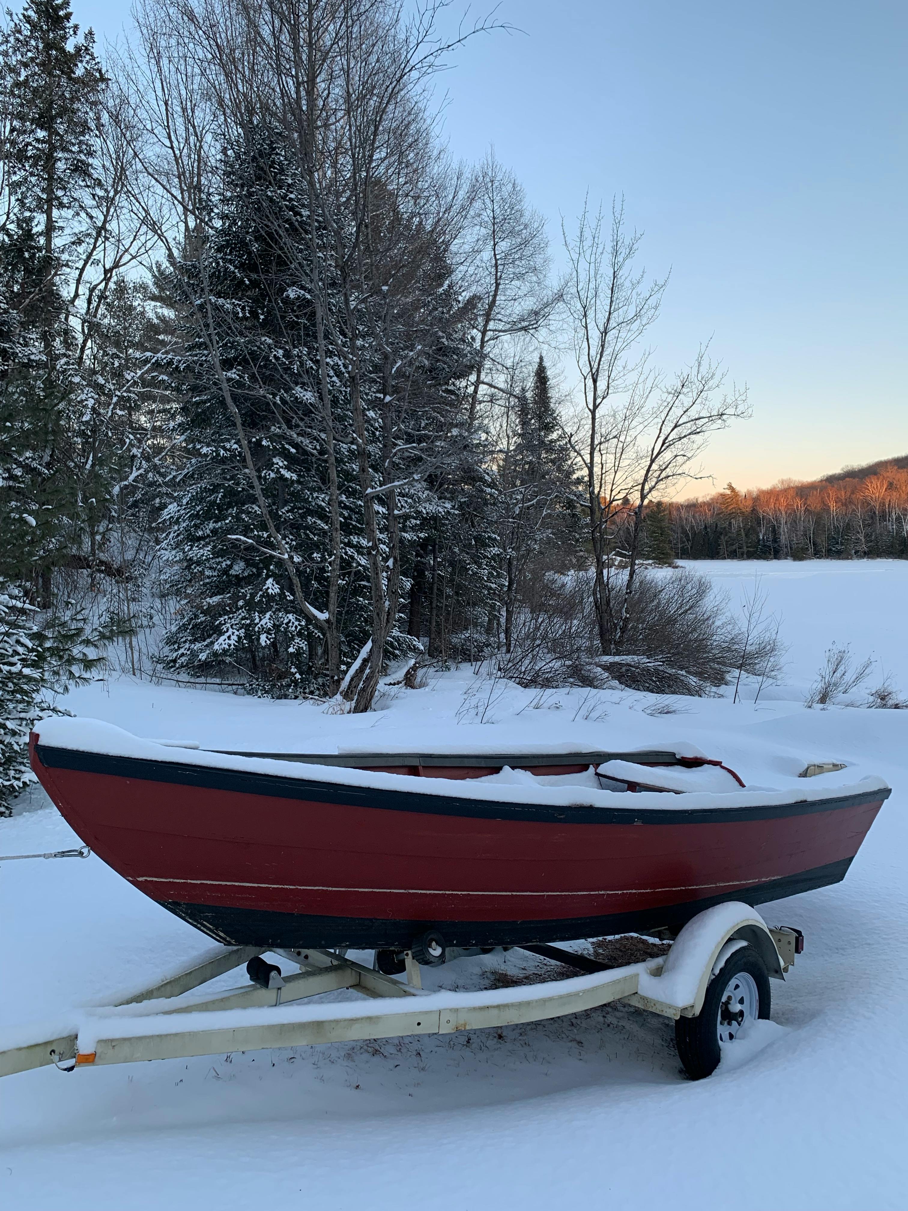 Boat trailer coated with a protective coating