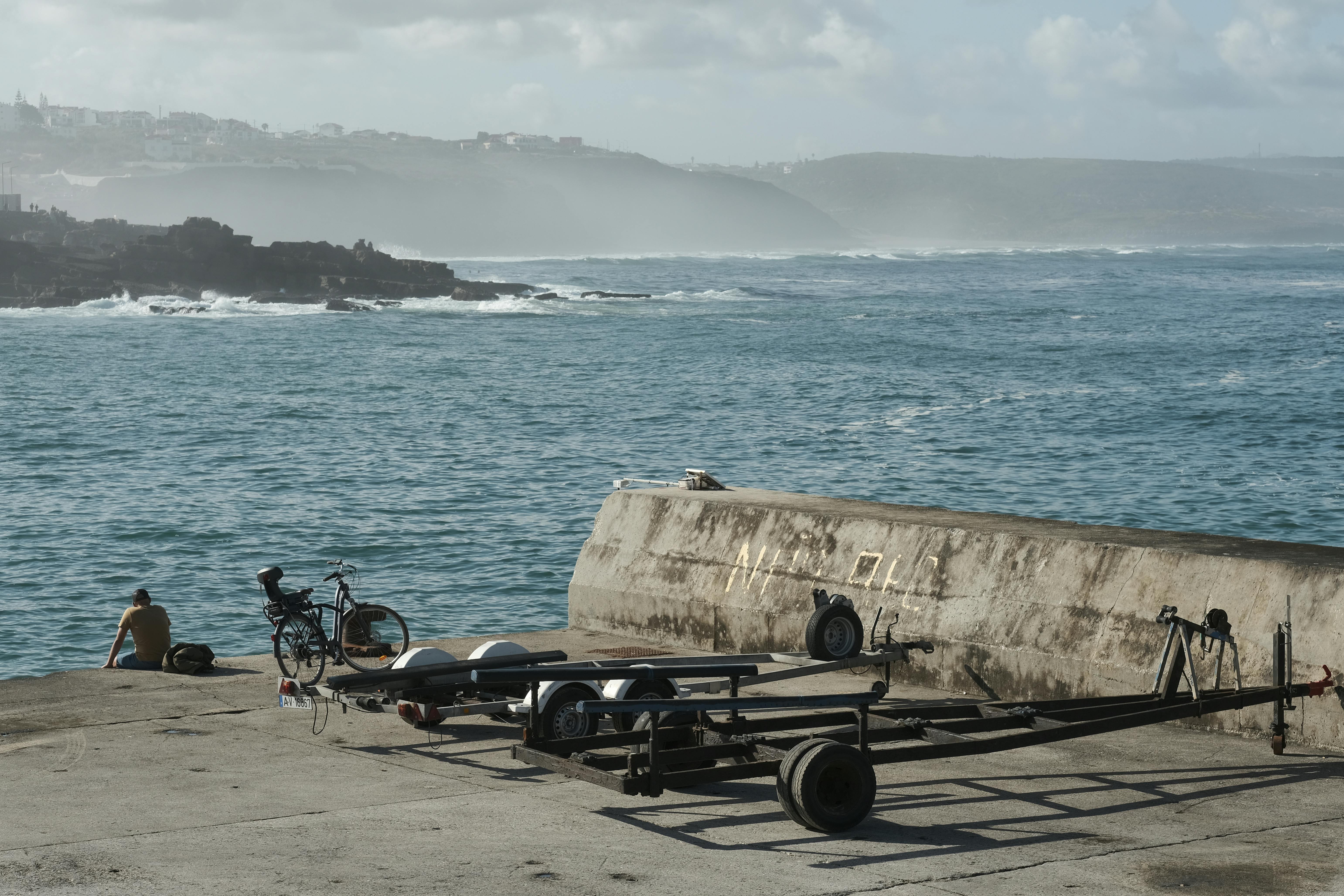 Rusted trailers at the sea side